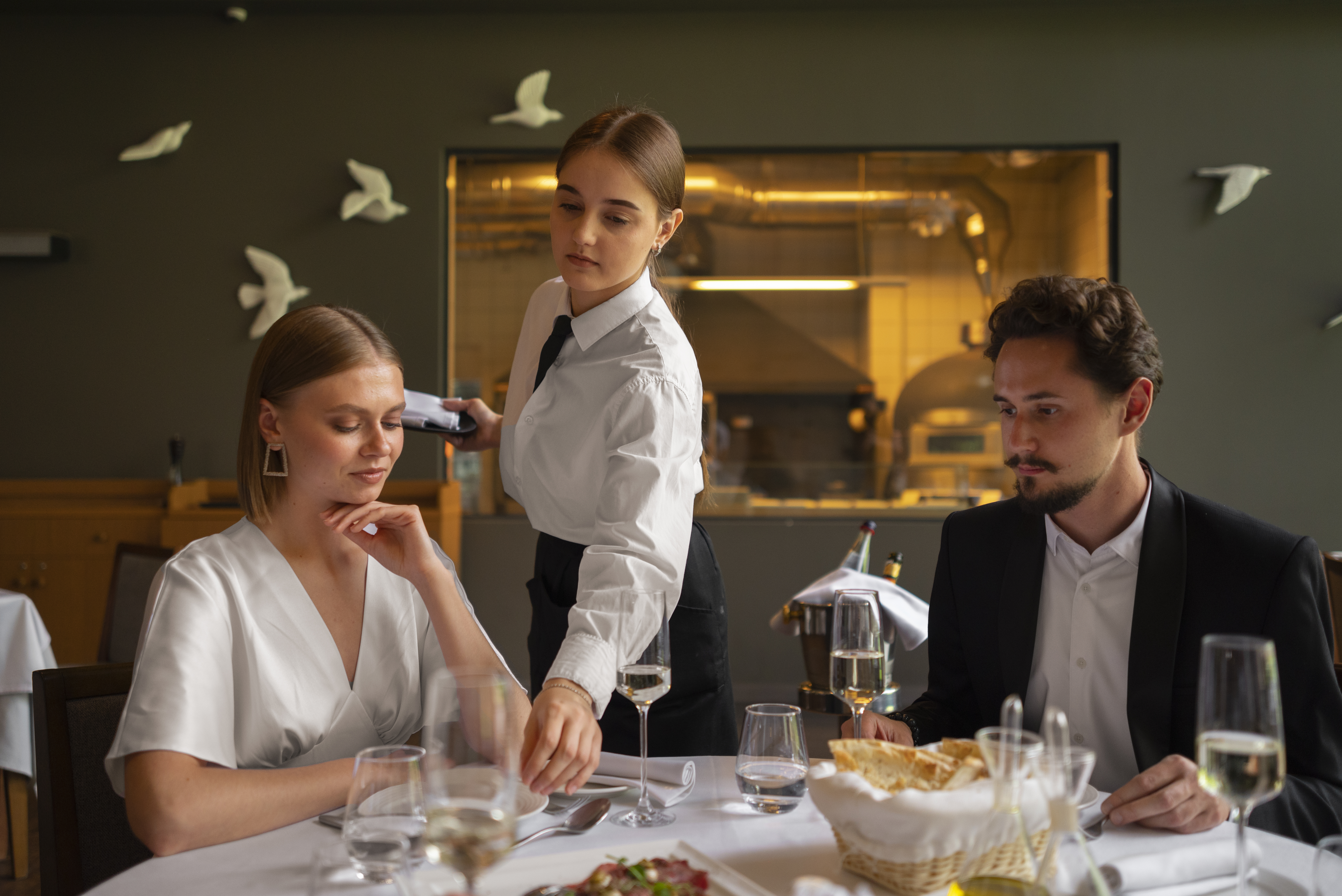 medium shot couple having lunch luxury restaurant 1